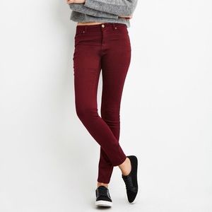Burgundy skinny jeans
